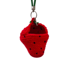 a knitted strawberry keychain